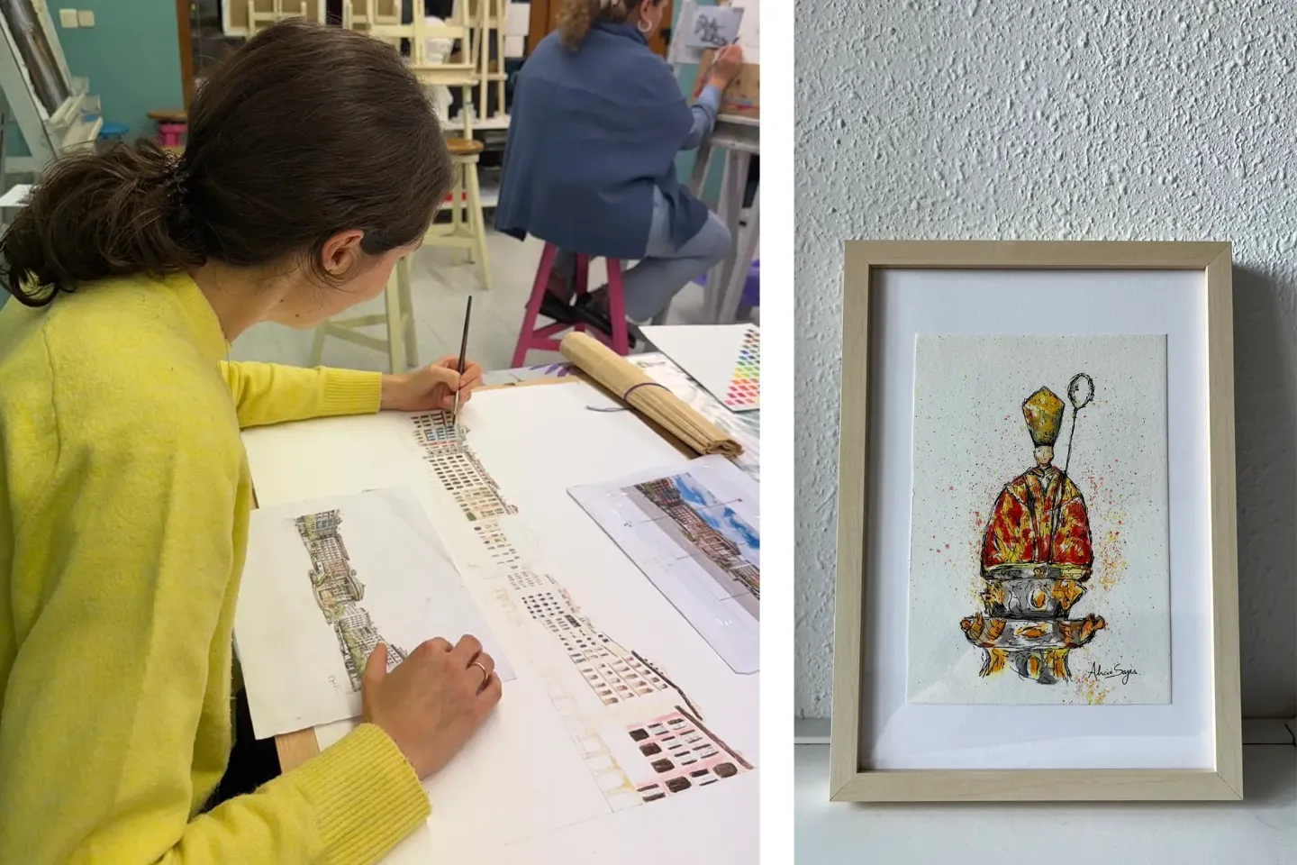 Imagen de una residente de la Clínica Universidad de Navarra pintando y otra al lado con un cuadro de San Fermín hecho por ella.